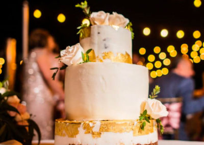 jamaica destination wedding rustic cake with flowers